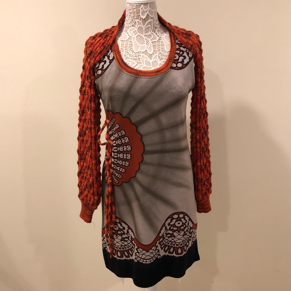 Shrug-like sleeve dress.